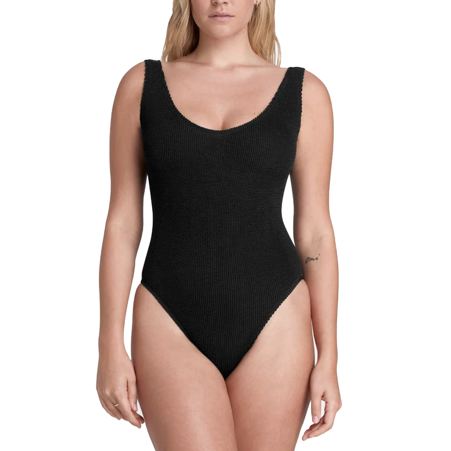 Shop the Bond Eye Swimwear Black one-piece, handcrafted in Australia from regenerated nylon. This sustainable and stylish swimwear features a plunge neckline, adjustable coverage, and wide shoulder straps
